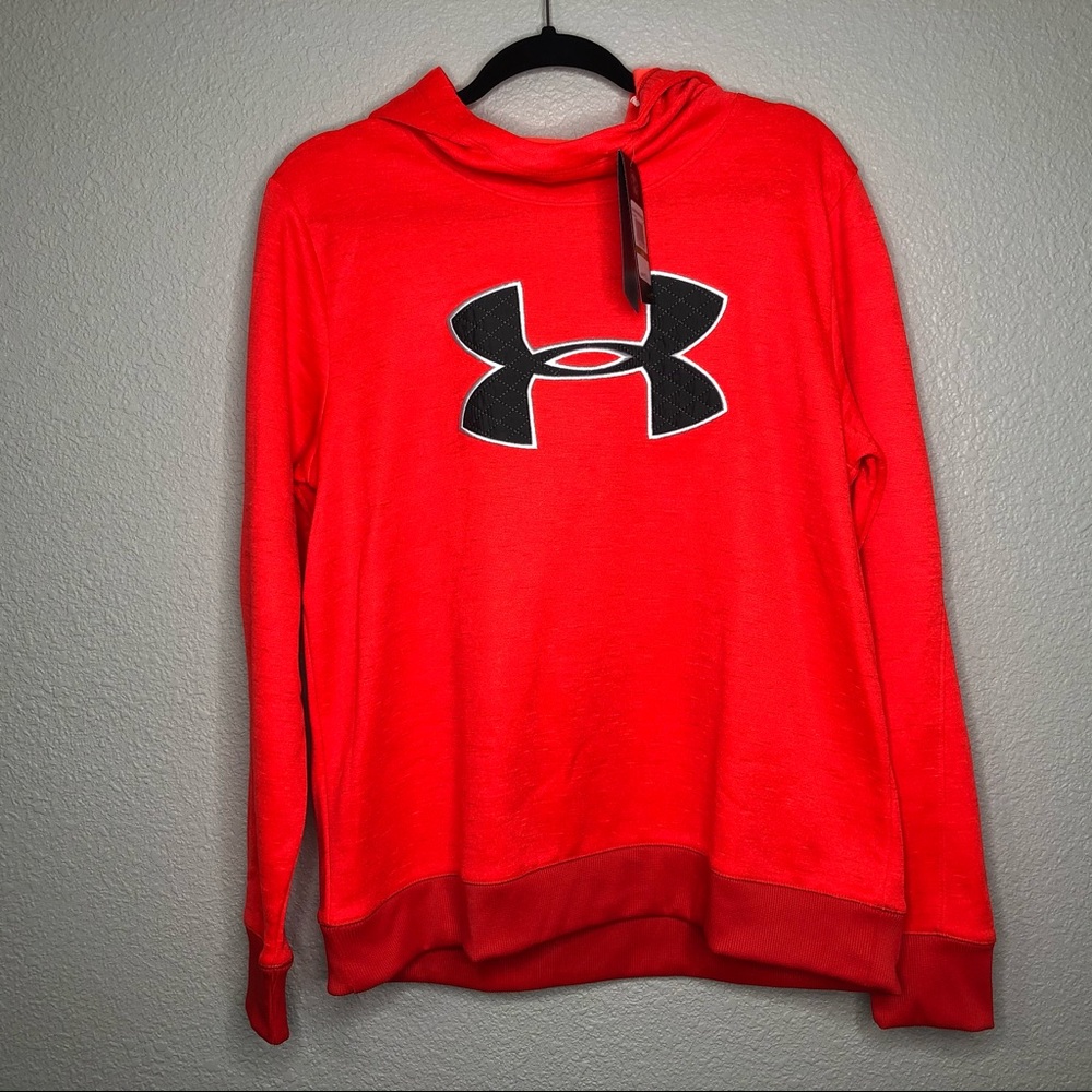 Under bright orange hoodie with gray logo